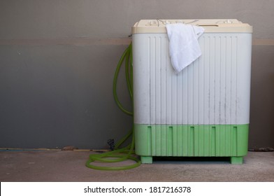 Laundry,Washing Machine
In Front Of The Gray Wall