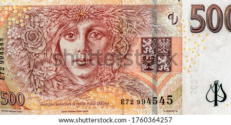 Laureate woman symbolizing all woman characters in Nemcova's books. Portrait from Czech Republic 500 Korun 2009 Banknotes.