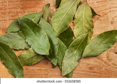 Laurel Leaves On A Wooden Table