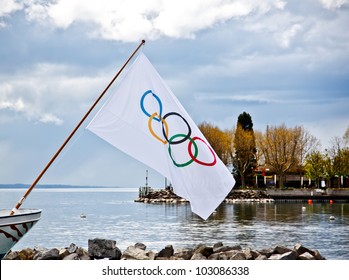 LAUSANNE APRIL 20: Olympic flag at Olympic museum on an old cruise ship in Lake Geneva in April 20, 2012. The symbol of the Olympic Games was originally designed in 1912 by Baron Pierre de Coubertin.