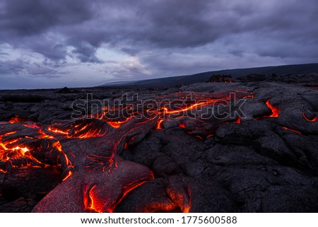 lava flow moving forward on a cloudy morning