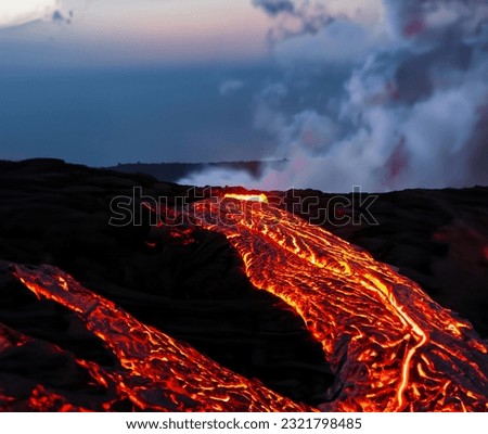 a lava flow at night in Maui, Hawaii is both stunning and eerie.