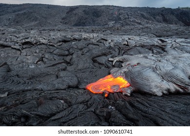 Lava Flow From Puu Oo In Kalapana, Big Island, Hawaii. Pali In The Background.