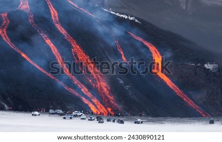 Lava flowing down a mountain hill in Fimmvörðuháls in Iceland