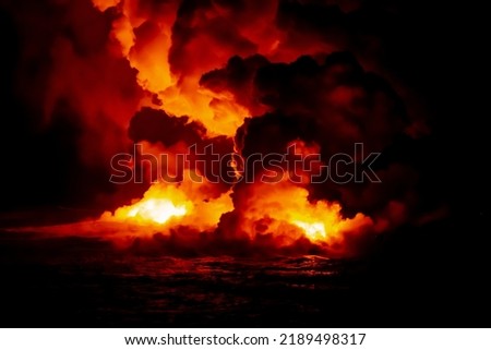 Lava is flowing into the ocean and created a man's face, looks like a fire of GOD, big Island Volcano National Park, Hawaii