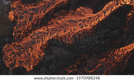 Lava Flows on active volcano aerial view, Mount Fagradalsfjall, Iceland
of Hot lava and magma coming out of the crater, April 2021 
