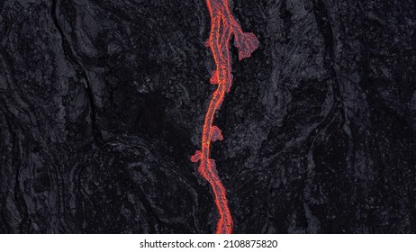 lava river on black, solidified lava