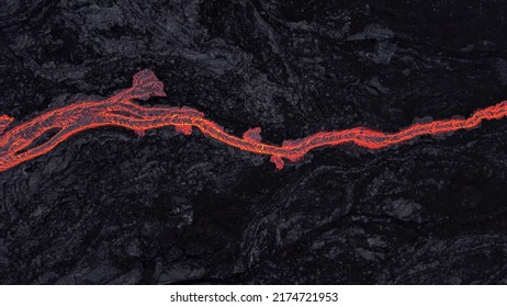 Lava River On Black Solidified Lava