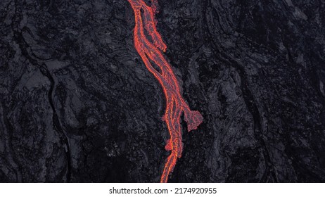 Lava River On Black Solidified Lava