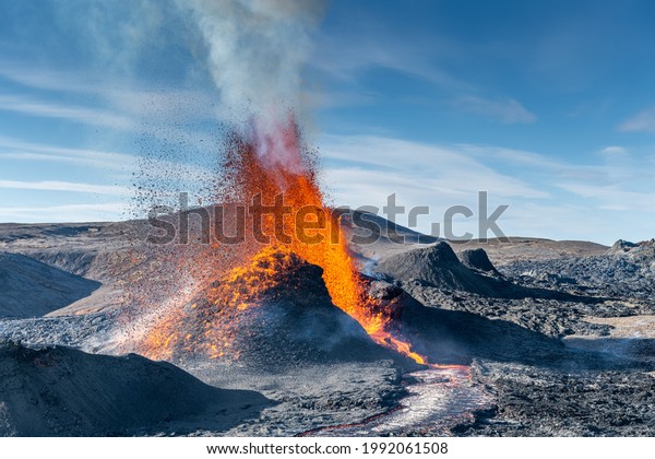 Lava spewing\
from an active volcano in\
Iceland