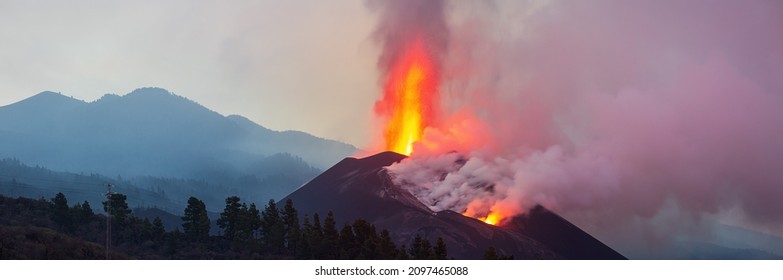 Lava spurts from erupting volcano Cumbre Vieja on the canary island la palma - Shutterstock ID 2097465088