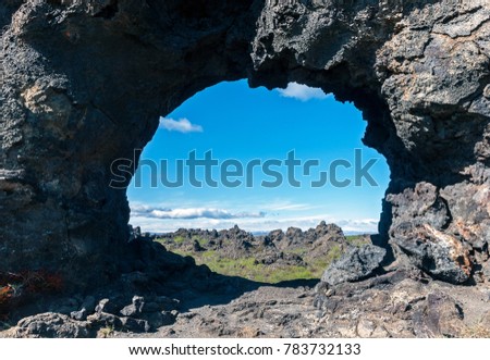 Lava window at Dimmuborgir, Myvatn area - Iceland. The Dimmuborgir area is composed of various volcanic caves and rock formations, reminiscent of an ancient collapsed citadel.