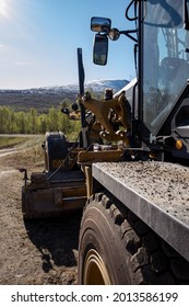 Lavangen, Norway 06.06.2021: Caterpillar Motorgrader 150 Cat Scraper Grade 150