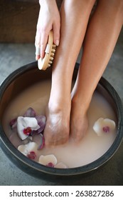 Lavender Bath.A Woman Washes The Feet In A Bowl Of Water And Salt To The Foot