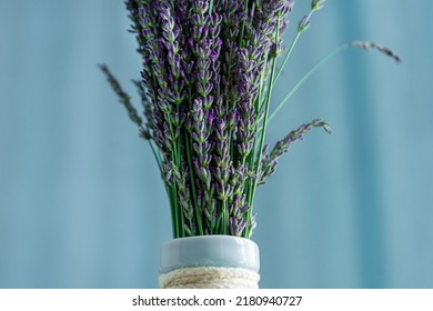 Lavender Flower In Vase On Aqua Color Background. Scandinavian Home Style.