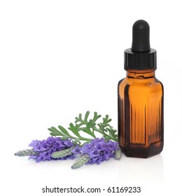 Lavender Herb Flower Leaf Sprigs With An Aromatherapy Essential Oil Dropper Bottle, Isolated Over White Background.