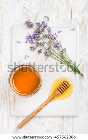 Similar – Image, Stock Photo Honey in glass with honeycomb and blossoms