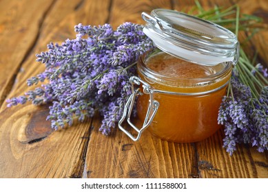 Lavender Honey On A Wooden Background