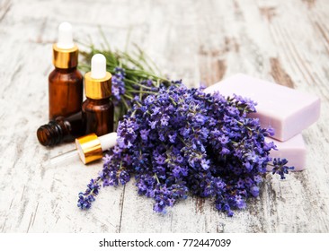 Lavender with soap on a wooden background