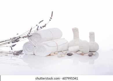 lavender with towel, ,stones and herbal ball for spa setting - Powered by Shutterstock