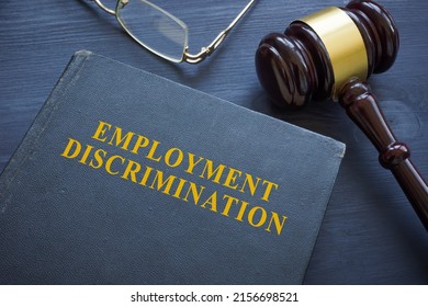 Law About Employment Discrimination And Gavel On The Table.