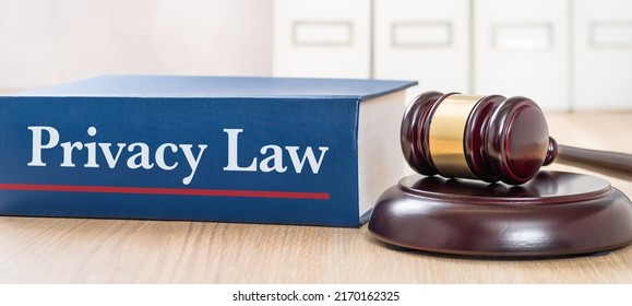 A law book with a gavel - Privacy law - Shutterstock ID 2170162325