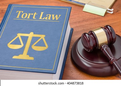 A Law Book With A Gavel - Tort Law