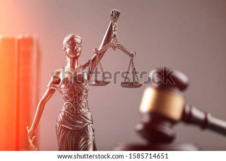 Law concept, bronze woman sculpture and gavel