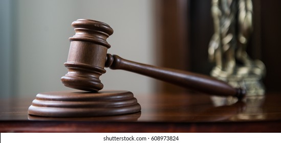 Law Concept. Closeup Of Gavel In Court Room