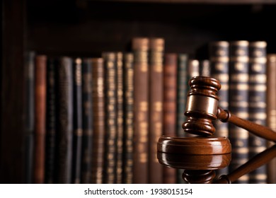 Law concept. Justice symbol on book background.