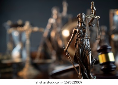 Law Concept. Justice Symbols On The Table.