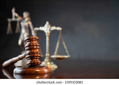 Law Concept. Justice Symbols On The Table.