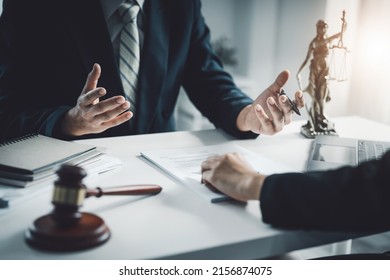 Law, Consultation, Agreement, Contract, Attorney or Lawyer holding a pen  is consulting with a client to explain the pattern of answering questions before going to court to decide a lawsuit