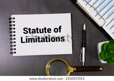 Law and justice concept. Against the background of the flag of South Africa lies a notebook with the inscription - STATUTE OF LIMITATIONS