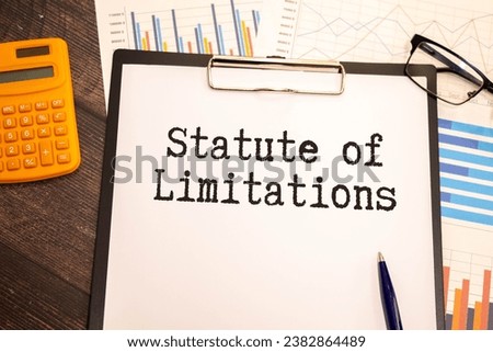 Law and justice concept. Against the background of the flag of South Africa lies a notebook with the inscription - STATUTE OF LIMITATIONS