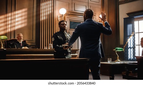 Law and Justice Court Case Witness Solemnly Swears that the Evidence He Shall Give Shall be the Truth and Nothing but the Truth Before Testifying to Lawyers and Judge in Courthouse.
