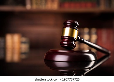 Law and justice. Wooden judge gavel, close-up view.