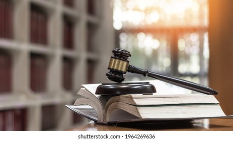 Law, Legal Judgement, Legistration, Litigation, Court Verdict, Judicial System And Civil Right And Social Justice Concept With Judge Gavel On Law Textbook In Attorney Law Firm, Lawyer Business Office