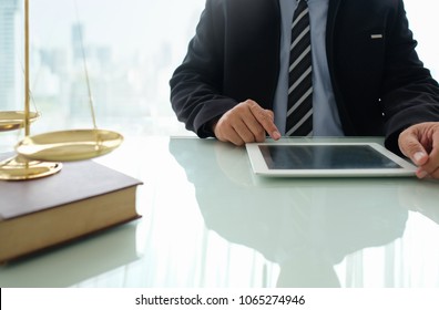 Law Legal Technology Concept. Lawyer Using Digital Tablet At Law Firm.