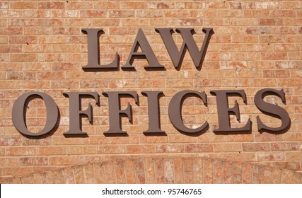 Law Offices Sign On Brick Wall