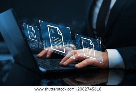 Law regulation and compliance rules on virtual screen concept. Businessman working at laptop computer and digital documents with checkbox lists. 