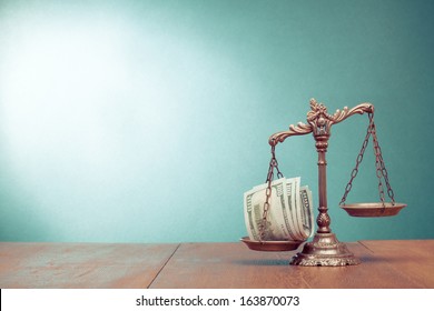 Law Scales And Cash Money On Table Concept Photo