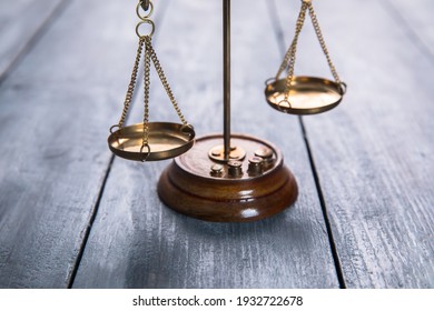 Law scales on table background. Symbol of justice