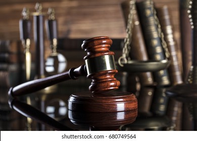 Law symbols. Lawyer theme. Judge wooden gavel. Place for typography.
