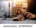 Law theme, gavel or mallet of the judge, lawyer enforcement officers, evidence-based cases taken into account in the court abount business, legislation.