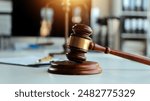 Law theme, gavel or mallet of the judge, lawyer enforcement officers, evidence-based cases taken into account in the court abount business, legislation.