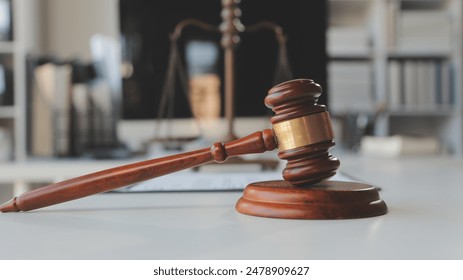 Law theme, gavel or mallet of the judge, lawyer enforcement officers, evidence-based cases taken into account in the court abount business, legislation.