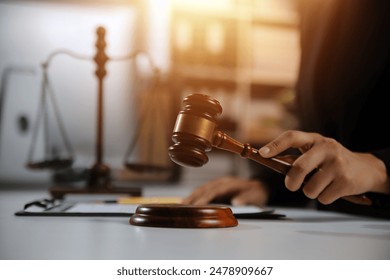 Law theme, gavel or mallet of the judge, lawyer enforcement officers, evidence-based cases taken into account in the court abount business, legislation.