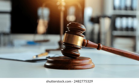 Law theme, gavel or mallet of the judge, lawyer enforcement officers, evidence-based cases taken into account in the court abount business, legislation.