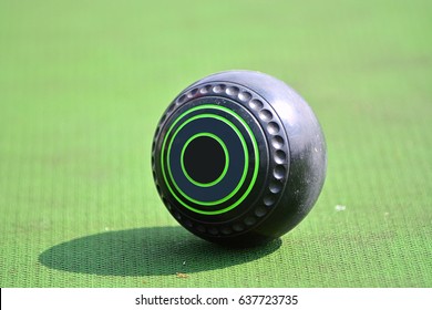 Lawn Bowl On The Green Blurred Background.